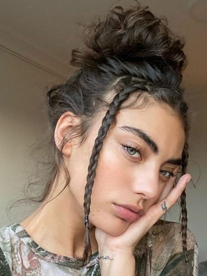 2. The Messy Bun Upgrade—Looking for easy and trendy summer hairstyles to beat the heat? Another day, another hairstyle inspo! Check out this article on summer hairstyle ideas that you can recreate for two weeks.