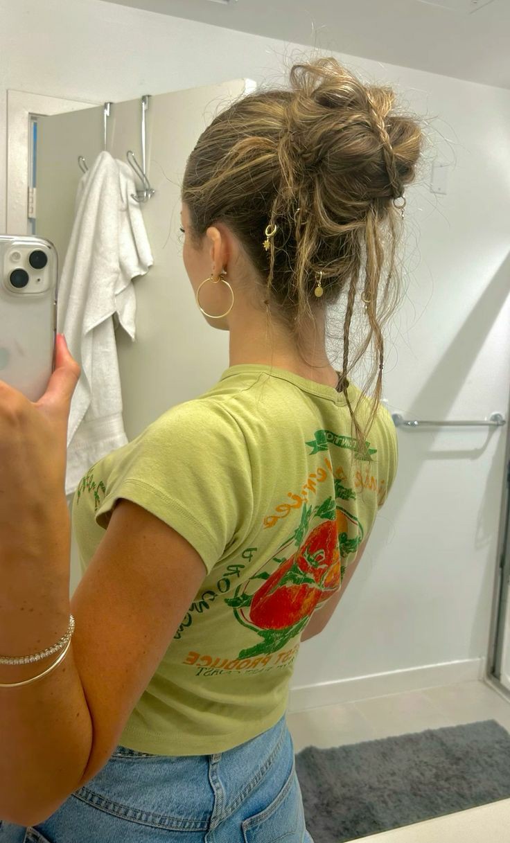 2. The Messy Bun Upgrade—Looking for easy and trendy summer hairstyles to beat the heat? Another day, another hairstyle inspo! Check out this article on summer hairstyle ideas that you can recreate for two weeks.
