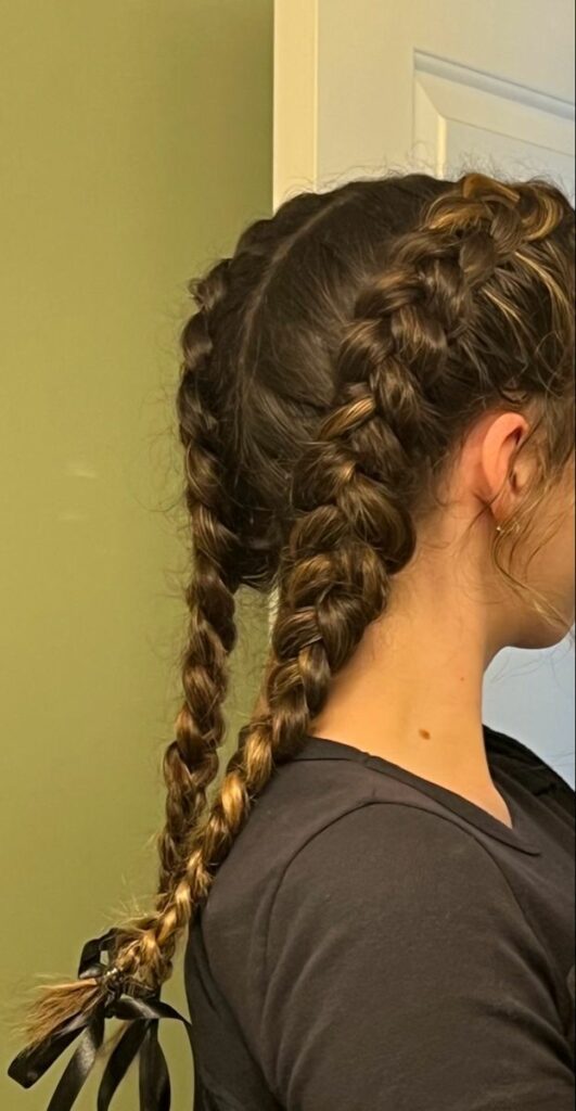 11. The French Braid Hairstyle—Looking for easy and trendy summer hairstyles to beat the heat? Another day, another hairstyle inspo! Check out this article on summer hairstyle ideas that you can recreate for two weeks.
