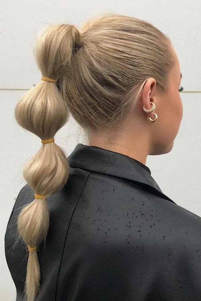3. The High Pony with a Pop of Color—Looking for easy and trendy summer hairstyles to beat the heat? Another day, another hairstyle inspo! Check out this article on summer hairstyle ideas that you can recreate for two weeks.