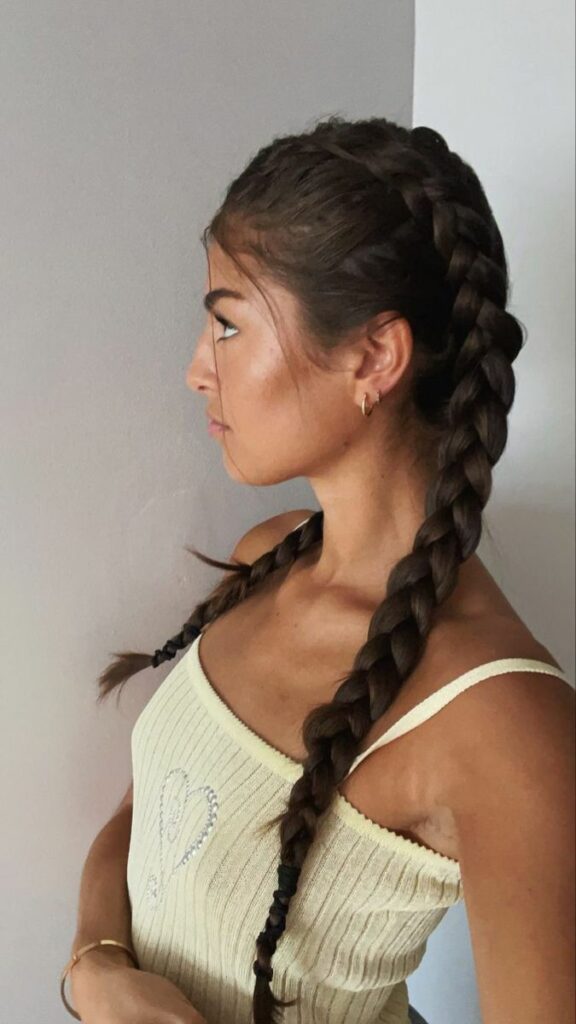 6.  Double Dutch Braid (aka the Boxer Braid)—Looking for easy and trendy summer hairstyles to beat the heat? Another day, another hairstyle inspo! Check out this article on summer hairstyle ideas that you can recreate for two weeks.
