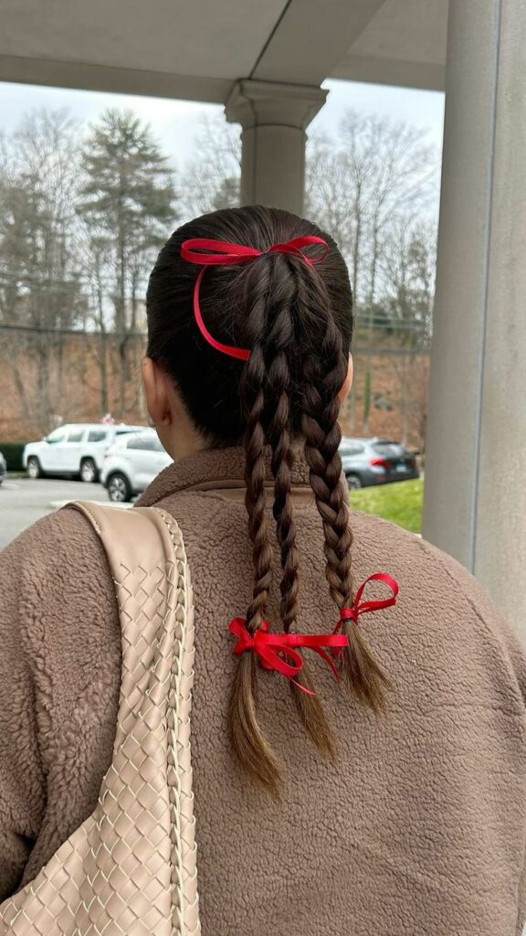 3. The High Pony with a Pop of Color—Looking for easy and trendy summer hairstyles to beat the heat? Another day, another hairstyle inspo! Check out this article on summer hairstyle ideas that you can recreate for two weeks.