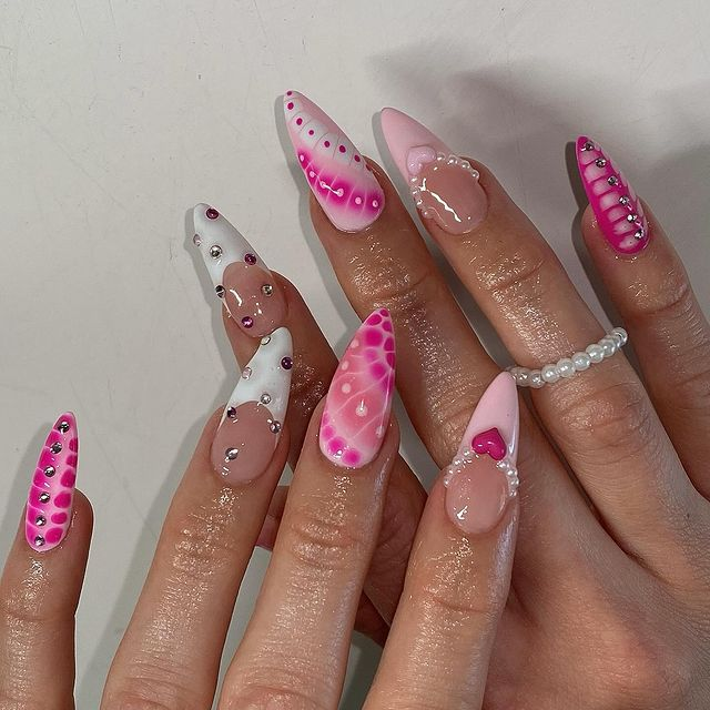 14. Pink nail design by nailzzbysteph—Want to rock pink nails but don't have great inspo? Here is the list of nail artists who have the best pink nail designs ever.