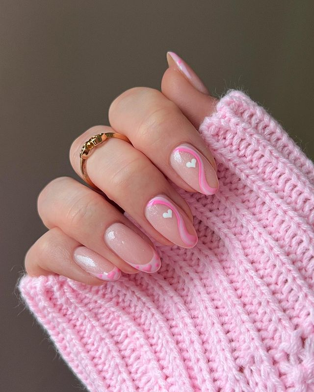 15. Pink nail design by glitterbels—Want to rock pink nails but don't have great inspo? Here is the list of nail artists who have the best pink nail designs ever.