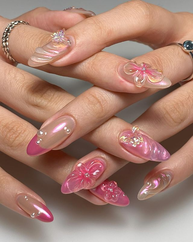 17. Pink nail design by clawedbyjamey—Want to rock pink nails but don't have great inspo? Here is the list of nail artists who have the best pink nail designs ever.
