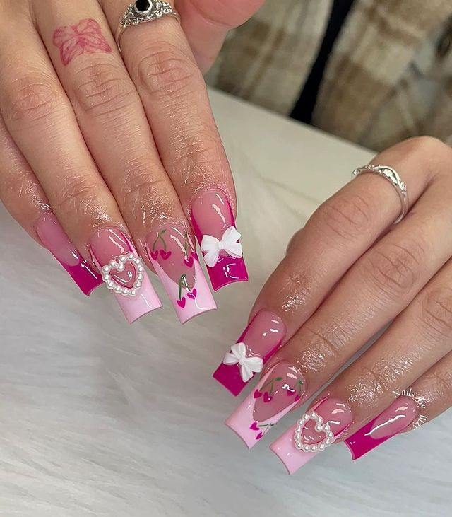 23. Pink nail design by beautynailsclip—Want to rock pink nails but don't have great inspo? Here is the list of nail artists who have the best pink nail designs ever.