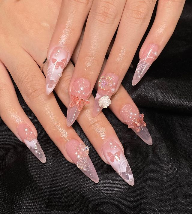 28. Pink nail design by bbbeautybar__—Want to rock pink nails but don't have great inspo? Here is the list of nail artists who have the best pink nail designs ever.