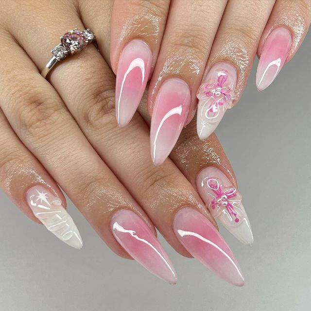 35. Pink nail design by strawbear_studio—Want to rock pink nails but don't have great inspo? Here is the list of nail artists who have the best pink nail designs ever.