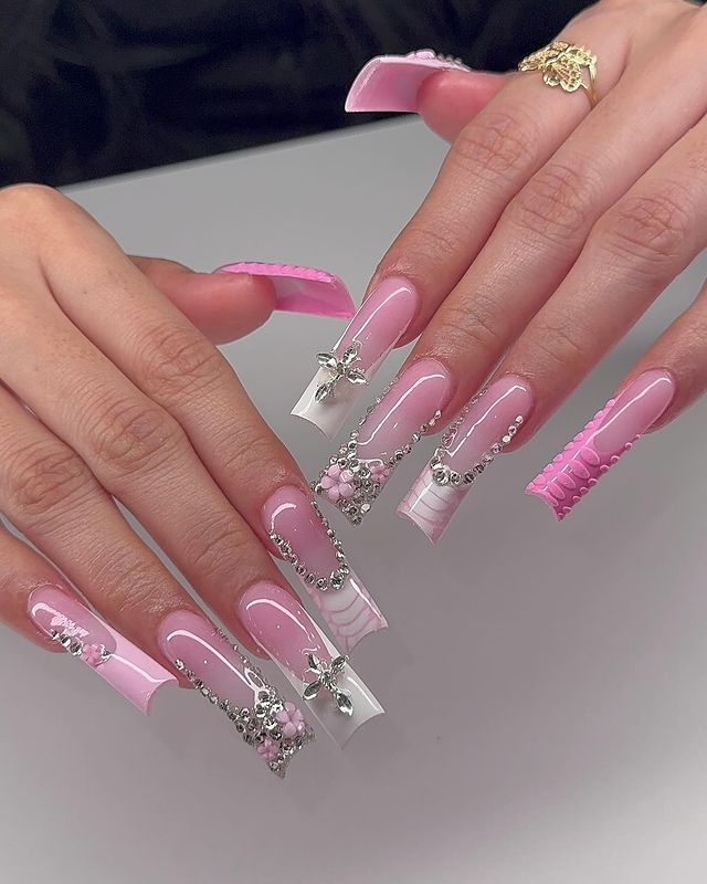 43. Pink nail design by nailsonglo—Want to rock pink nails but don't have great inspo? Here is the list of nail artists who have the best pink nail designs ever.