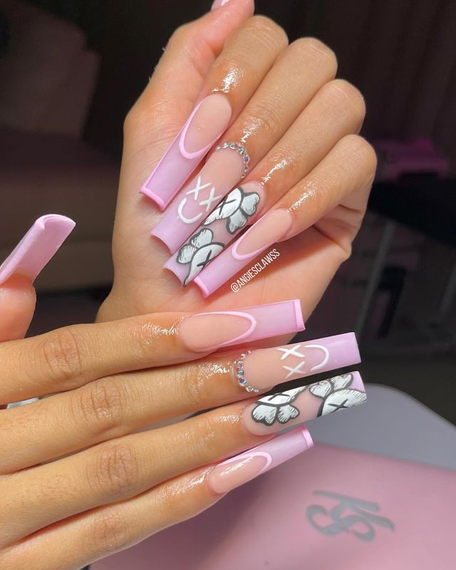 53. Pink nail design by angiesclawss—Want to rock pink nails but don't have great inspo? Here is the list of nail artists who have the best pink nail designs ever.