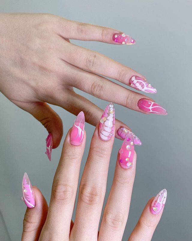 57. Pink nail design by sekii.xii—Want to rock pink nails but don't have great inspo? Here is the list of nail artists who have the best pink nail designs ever.