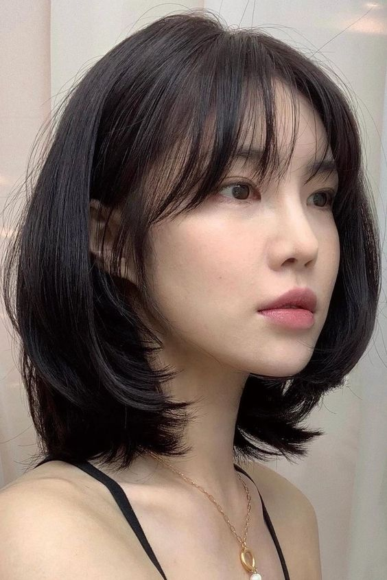 Chic and Trendy Korean Haircut Ideas: 13. Layered Lob with Texture
